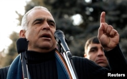 Armenian presidential candidate Raffi Hovannisian addresses supporters at a rally in Yerevan, Feb. 19, 2013.