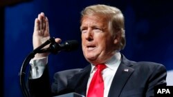 President Donald Trump speaks at the American Farm Bureau Federation's 100th Annual Convention, Jan. 14, 2019, in New Orleans. 