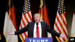 FILE - Republican Presidential candidate Donald Trump speaks at a rally in Raleigh, North Carolina, July 5, 2016. Trump has called the FBI's decision not to recommend charges against Clinton "disgraceful."