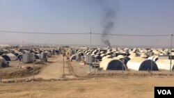 Camps like this one in northern Iraq are filling up fast with people fleeing war, IS and extreme poverty. Aid workers say they don't know if they will have the resources to care for all the refugees if and when Mosul in reclaimed, in Debaga, Kurdistan, Iraq, Oct. 23, 2016. (H.Murdock/VOA)