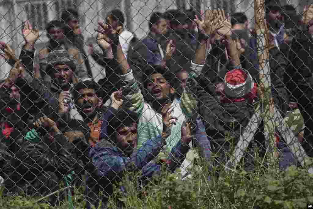 Migrants, most of them from Pakistan, protest inside the entrance of Moria camp in the Greek island of Lesbos against the EU- Turkey deal about migration.