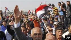 Protesters chant anti-government slogans during a demonstration against the lack of basic services in Basra, Iraq's second-largest city, 550 kilometers (340 miles) southeast of Baghdad, February 18, 2011