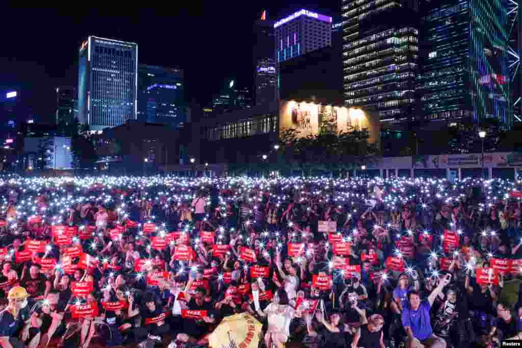 Demonstrators rally ahead of the G20 summit, urging the international community to back their demands for the government to withdraw the extradition bill in Hong Kong, China.