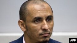 Al Hassan Ag Abdoul Aziz Ag Mohamed Ag Mahmoud lors de sa première apparition devant la CPI, La Haye, le 4 avril 2018