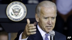 Vice President Joe Biden answers a question after speaking at the University of Pittsburgh, in Pittsburgh, Pennsylvania, November 4, 2011.