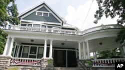 FILE - The home of president Warren G. Harding is seen in Marion, Ohio, July 21, 2008. Plans are to build a 15,000-square-foot presidential center at the property by 2020.