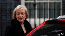 FILE - Andrea Leadsom, leader of the House of Commons, leaves after attending a cabinet meeting at 10 Downing Street, in London, Dec. 18, 2018.