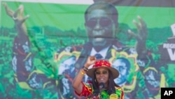 FILE - Zimbabwe's first lady Grace Mugabe greets supporters at a rally in Lupane about 170 Kilometres north of Bulawayo, Zimbabwe, July 21, 2017. 