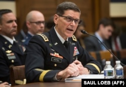 FILE - U.S. Army General Joseph Votel, commander of the U.S. Central Command, testifies during a House Armed Services Committee hearing on Capitol Hill in Washington, Feb. 27, 2018.