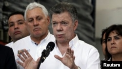 Colombia's President Juan Manuel Santos talks to reporters after a meeting with regional authorities in Cucuta, Colombia, Feb. 8, 2018.