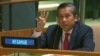 Myanmar's ambassador to the United Nations Kyaw Moe Tun holds up three fingers at the end of his speech to the General Assembly where he pleaded for International action in overturning the military coup in his country 