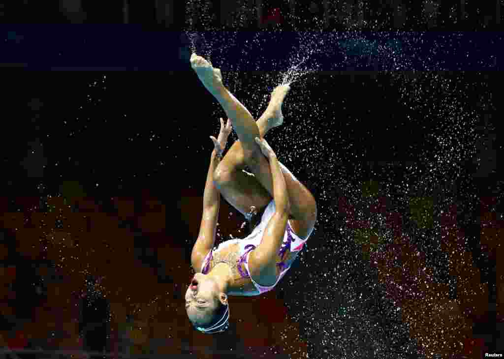 Team Japan competes during the women&#39;s free combination preliminary swimming event in the 18th FINA World Swimming Championships at Yeomju Gymnasium, Gwangju, South Korea.