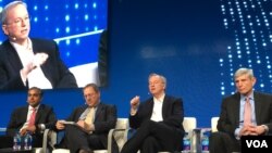 From left, Raj Shah of Defense Innovation Unit, moderator David Sanger of the New York Times, Eric Schmidt of Alphabet, and Norton Schwartz of Business Executives for National Security at the Milken Global Conference in Beverly Hills, California, May 1, 2017. (E.Lee/VOA) 