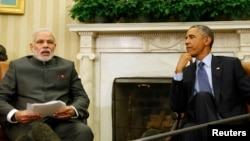 U.S. President Barack Obama (R) listens as India's Prime Minister Narendra Modi. (File)