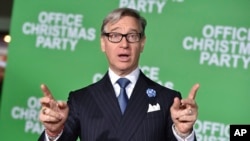 FILE - Paul Feig arrives at the Los Angeles premiere of "Office Christmas Party" at the Village Theatre Westwood, Dec. 7, 2016. 