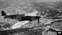 FILE: This undated photo shows one of the famed British RAF Supermarine Spitfire planes during World War II.