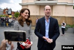 Britain's Prince William and Catherine Duchess of Cambridge talk to members of the media about their newborn nephew, as they arrive to launch the King's Cup Regatta in London, Britain, May 7, 2019.