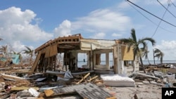 Debris surrounds a destroyed structure in the aftermath of Hurricane Irma, Wednesday, Sept. 13, 2017, in Big Pine Key, Fla. (AP Photo/Alan Diaz)