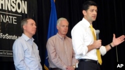 House Speaker Paul Ryan joins Wisconsin state Assembly Speaker Robin Vos, left, and Sen. Ron Johnson, R-Wis., center, at a campaign rally for Johnson in Burlington, Wisconsin, May 5, 2016.