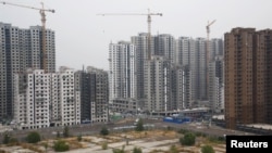 资料照：北京的一处居民区工地（2018年9月27日）
