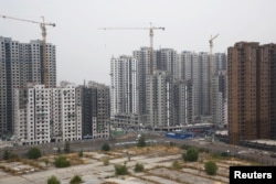 资料照：北京的一处居民区工地（2018年9月27日）