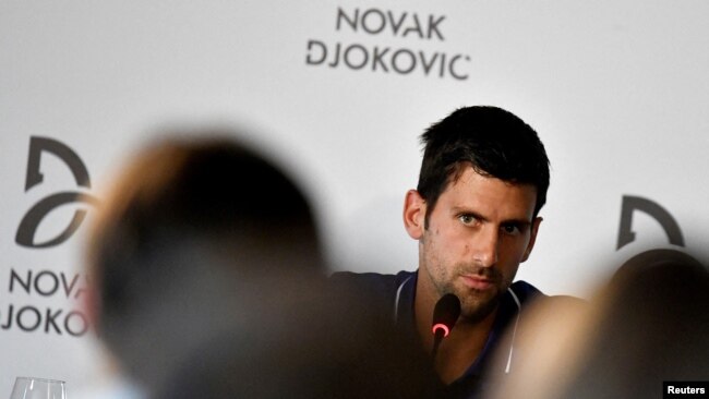 FILE - Tennis player Novak Djokovic speaks during a news conference in Belgrade, Serbia, July 26, 2017.
