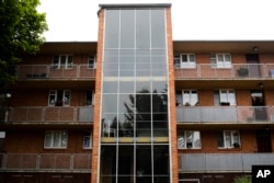 This Tuesday, June 27, 2017 photo shows one of The Houses with Balcony Access on the Dessau-Toerten housing estate, designed by architect Hannes Meyer in Dessau, Germany.