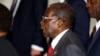Mugabe de retour au Zimbabwe après une visite médicale à Singapour