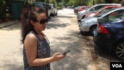 The proposed law could also affect ordinary people using mobiles to send photos, hailing cabs or anything that involves geospatial data. (A. Pasricha/VOA)
