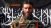 FILE - Wanted terrorist Mokhtar Belmokhtar speaks in this undated still image taken from video released by Sahara Media, Jan. 21, 2013.