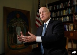Gov. Jerry Brown discusses the goals of the global climate summit he is hosting in San Francisco and legislation he signed directing California to phase out fossil fuels for electricity by 2045 during an interview with The Associated Press.
