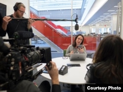 FILE - White House correspondent Maggie Haberman conducts an interview at The New York Times headquarters in New York, Jan. 18, 2018.