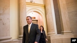 US House Speaker John Boehner walks to the House chamber on Capitol Hill, Oct. 3, 2013.