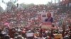 Movement for Democratic Change (MDC) supporters hold a poster of leader Nelson Chamisa during the party's 19th-anniversary celebrations in Harare, Zimbabwe, Saturday, Oct. 27, 2018.