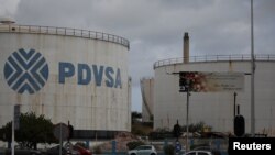 The logo of Venezuelan oil company PDVSA is seen on a tank at Isla refinery in Willemstad on the island of Curacao, April 22, 2018.