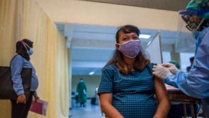 Tiêm chủng COVID cho người đang mang thai, tại Subaraya, tỉnh Đông Java, Indonesia ngày 19/8/2021, 