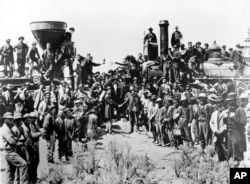 Railroad officials and employees celebrate the completion of the first railroad transcontinental link in Prementory, Utah on May 10, 1869. Despite their contribution, not a single Chinese laborers were in the photo.