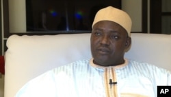 In this image taken from video, Gambia's new president Adama Barrow talks during an interview with The Associated Press in Dakar, Senegal, Jan. 21, 2017.