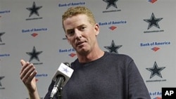 Jason Garrett responds to questions during a news conference after being named interim coach of the Dallas Cowboys, at the NFL football team's training facility in Irving, Texas, 08 Nov 2010