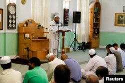 FILE - Worshippers listen after prayers at the Islamic Center of Fort Pierce, a center attended by Omar Mateen — who attacked the Pulse nightclub in Orlando — in Fort Pierce, Florida, June 17, 2016.