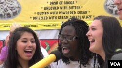 Some young people taking part in the Minnesota State Fair sing along