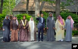 FILE - President Barack Obama (c) stands with Arab Gulf leaders at Camp David, May 14, 2015.
