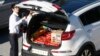 FILE - A South Korean vendor, his car filled with Choco Pie snacks and instant noodles, prepares to leave for the Kaesong Industrial Complex just north of the demilitarized zone separating the two Koreas, Sept. 16, 2013.