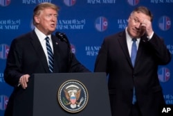 FILE - In this Feb. 28, 2019, photo, U.S. President Donald Trump, accompanied by Secretary of State Mike Pompeo, speaks at a news conference in Hanoi, following talks with North Korean leader Kim Jong Un. Trump said he walked away from his second summit with North Korean leader Kim Jong Un because Kim demanded the U.S. lift all of its sanctions.