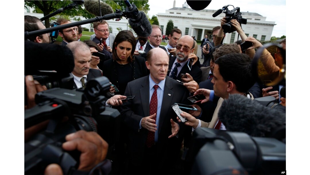 Sen. Chris Coons, D-Del., talks with reporters after all 100 U.S. senators were briefed on North Korea at the Eisenhower Executive Office Building on the White House complex, Washington, April, 26, 2017.
