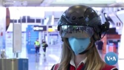 'Smart Helmets' at Rome Airport Check On Passengers' Temperatures 