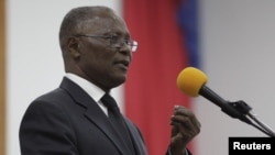 Provisional president candidate Jocelerme Privert gives his speech in the Special Bicameral Commission for the election of the provisional President of the Republic in the Haitian Parliament in Port-au-Prince, Haiti, Feb. 13, 2016. 