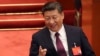 中共总书记习近平和前总书记胡锦涛在十九大开幕式上交谈（2017年10月18日）