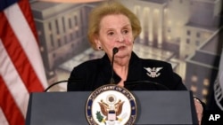 Former Secretary of State Madeleine Albright speaks at a reception celebrating the completion of the U.S. Diplomacy Center Pavilion at the State Department in Washington, Jan. 10, 2017.