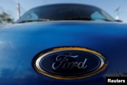 The Ford logo is seen on the front of a car in Cuautitlan Izcalli, Mexico, Jan. 4, 2017.